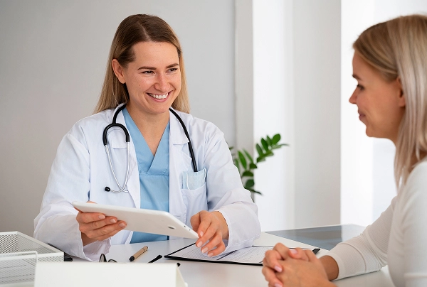 Physician consulting with a patient