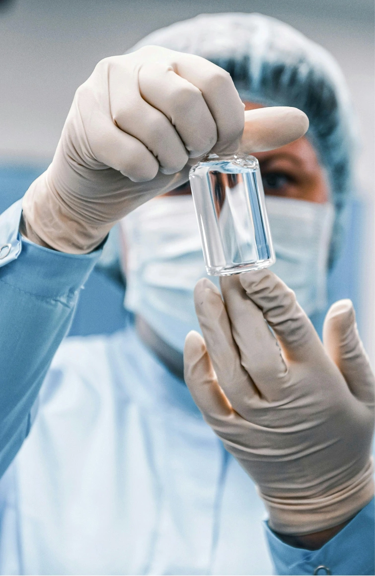 Clinician inspecting a sterile preparation